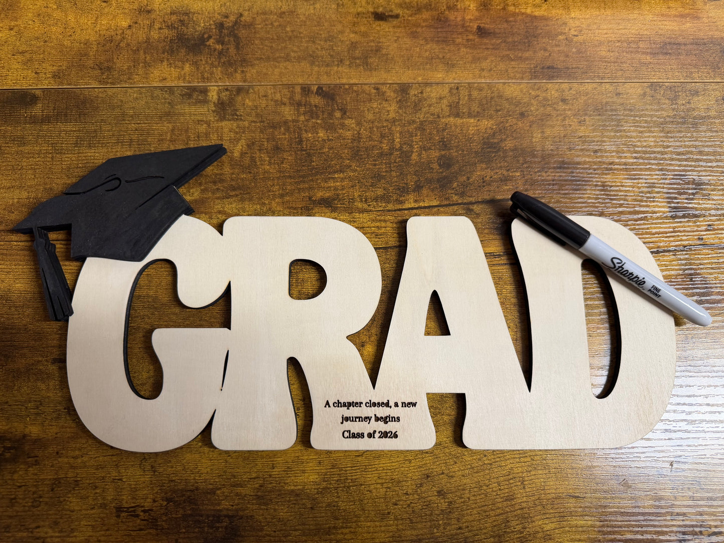 Graduation sign with sharpie